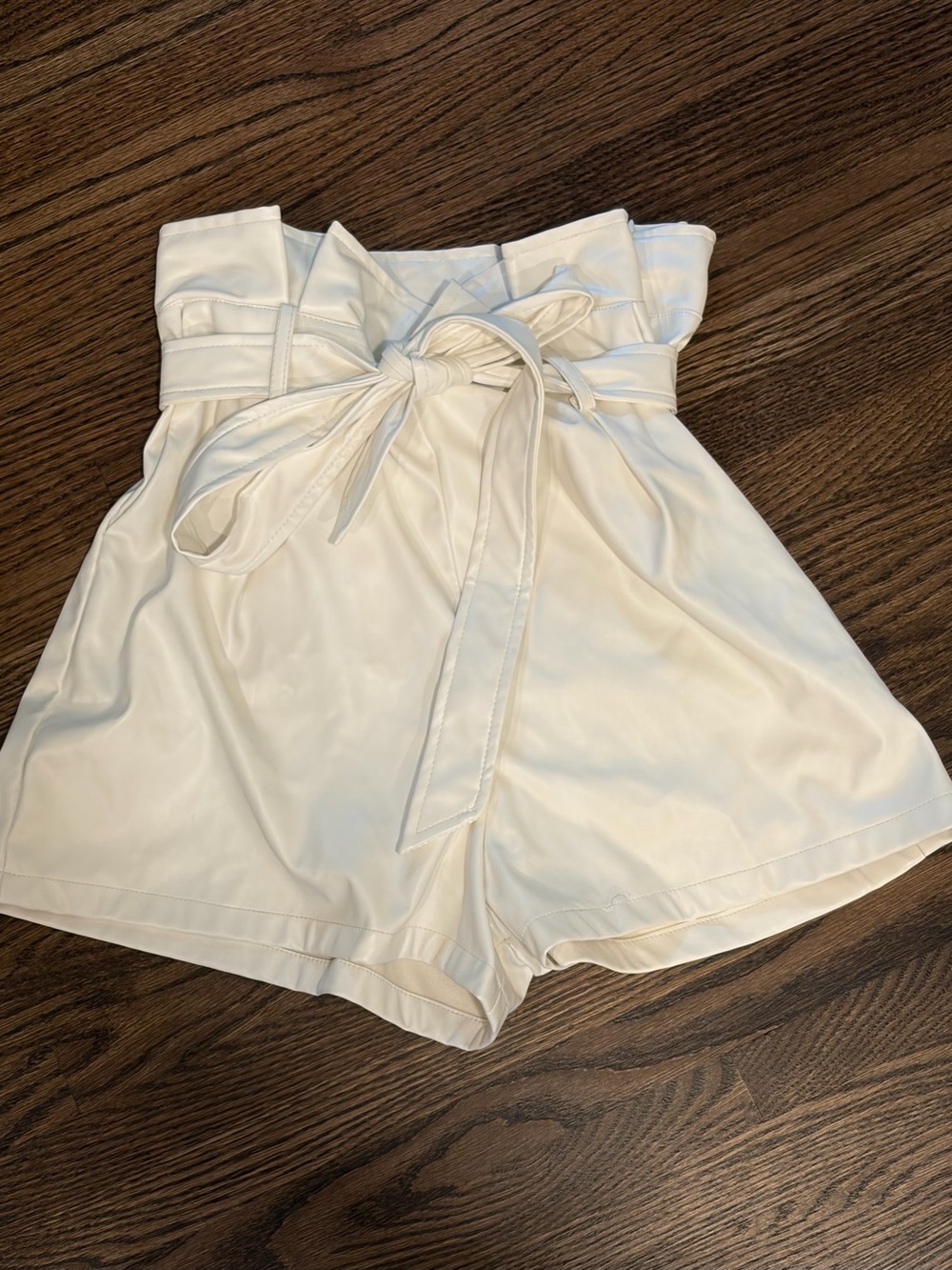 High-Waist Paperbag Shorts with Self-Tie Belt — White Faux Leather